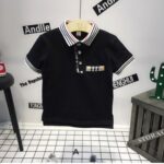 Short-Sleeved polo shirts with a three-button placket - Classic black with tan/black check accents
