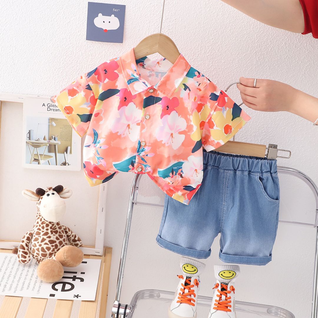 11521 Short-Sleeved button-down shirt with a bold floral print and denim short - Features an orange/coral base with yellow and white flowers - Image 1