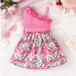 Pink Petal One-Shoulder Dress - A charming toddler dress featuring a pink ribbed, one-shoulder ruffle top and a vibrant floral skirt