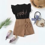 The Meow & Mocha Skort Set - Black ruffle-sleeve "MEOW" graphic tee and a mocha-brown wrap skort with a bow accent