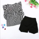 Zebra Stripe Ruffle Co-ord - A stylish black and white striped ruffle-sleeve top paired with simple black wrap shorts